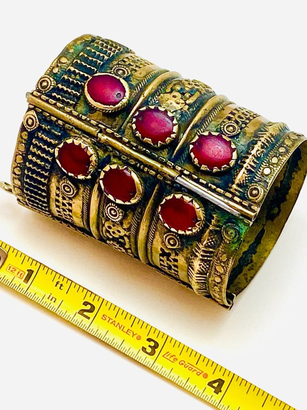 “Vintage Brass Tribal Cuff Bracelet with Red Cabochon Stones